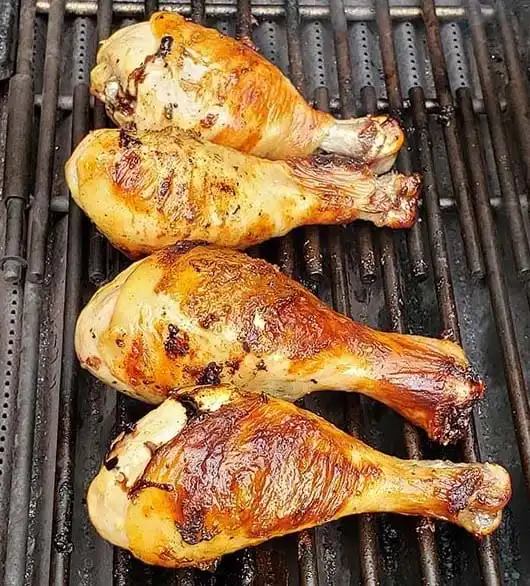 Chicken legs on a grill