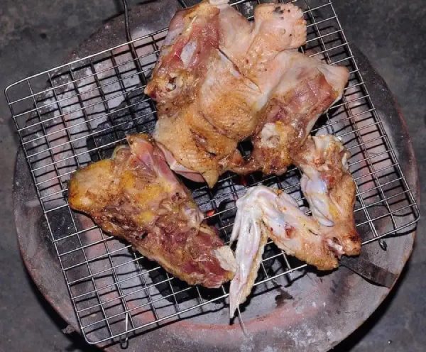 Chicken parts on a grill