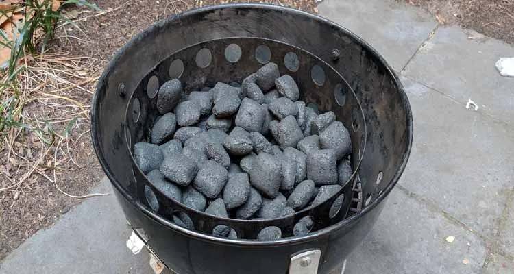 Fill your smoker’s charcoal chamber 