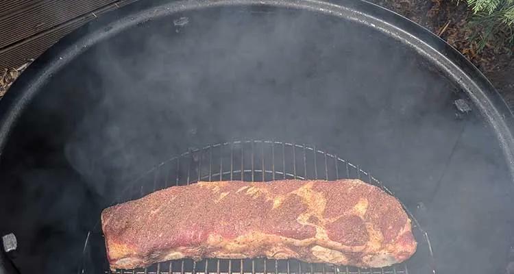 Producing smoke on a weber smokey mountain