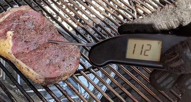 checking steak temperature